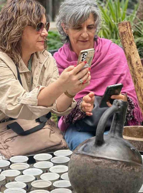 Tourists participating in a traditional Ethiopian coffee drinking ceremony