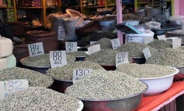 Tourists exploring a coffee bean shop in Addis Ababa during a cultural tour