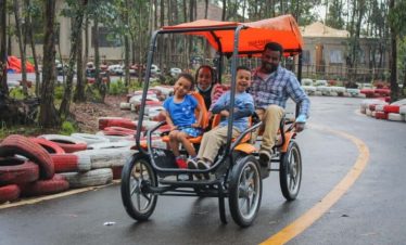 Family enjoying a horse-drawn carriage ride during a city tour in Addis Ababa