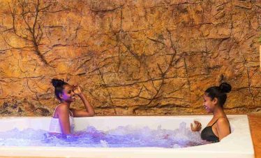Tourists enjoying a Jacuzzi at Entoto Spa during a relaxing tour in Addis Ababa